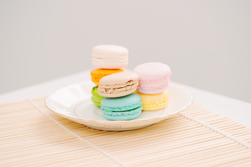 Delicious french dessert. Colorful pastel cake macaron or macaroon