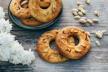 Cookies in the shape of a ring on a wooden background