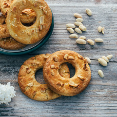 Cookies in the shape of a ring on a wooden background