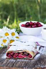 Strudel with a cherry. Cherry pie.