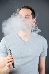 man using a vape