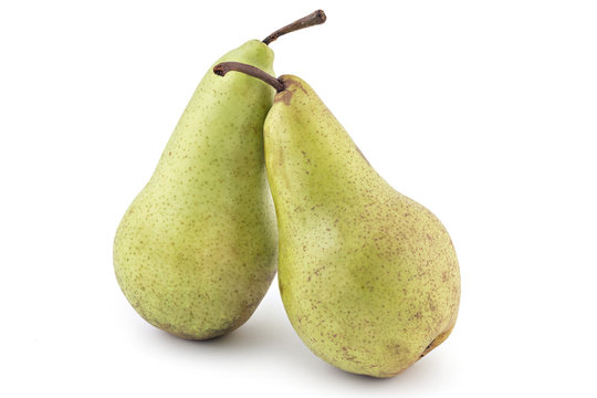 Two juicy ripe organic Conference pear isolated on a white background (Pyrus communis)