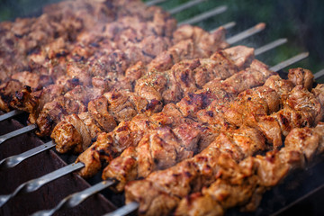 Cooking meat on the fire.