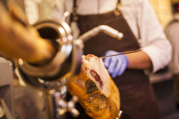 butcher serving at his butcher shop