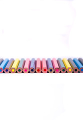 Colorful office supplies in white background