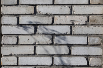 White Wall Background. Old Grungy Brick Wall Horizontal Texture. Brickwall Backdrop. Stonewall Wallpaper. Vintage Wall With Peeled Plaster. Retro Grunge Wall. With Uneven Stucco