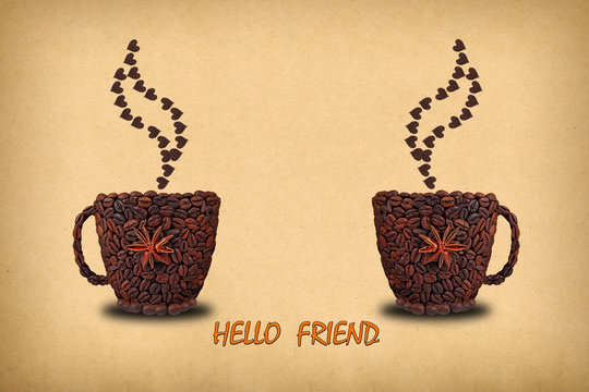 Fototapeta Creative concept photo  of two cups of coffee and hearts  made of coffee beans. Inscription  "HELLO FRIEND."