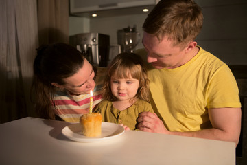 Happy Family celebrating child's birthday party togetherness .