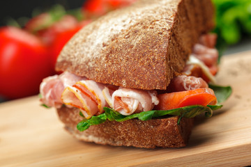 sandwich on a wooden table