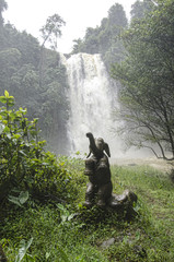 Vietnam waterfall with elephant sculpture