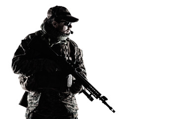 Studio shot of United States Marine with rifle weapons in uniforms. Military equipment, army helmet, combat boots, tactical gloves. Isolated on white, weapons, army, patriotism concept