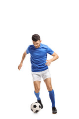 Fototapeta na wymiar Soccer player dribbling