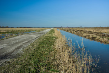 Fototapeta premium Road and water canal