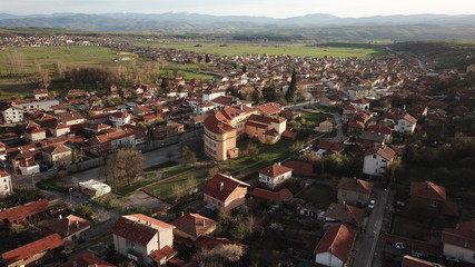 Early spring overview of Kocherinovo town during sundown
