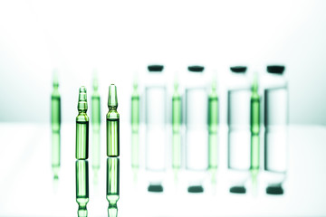 Group of ampoules with a transparent medicine in medical laboratory