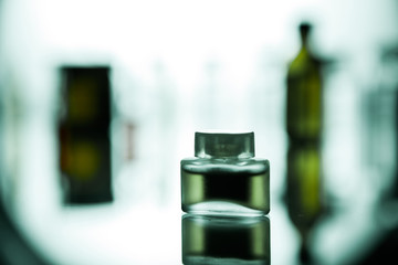 Group of ampoules with a transparent medicine in medical laboratory