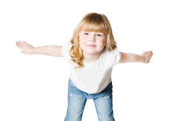 Funny little girl  in jeans and white t-shirt  joy with the raised hands looking at camera  over white background
