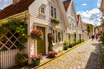 Fototapeta na wymiar Street with white houses in the old part of Stavanger, Norway.