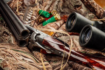 Hunting equipment on the wooden background. Hunt concept.