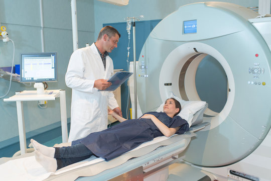 female patient talking to doctor before mri scan