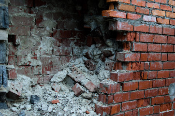 The broken wall of bricks