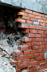 The broken wall of bricks