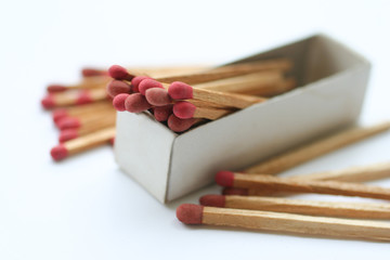 Matches in box on white background