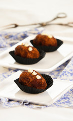 russian cake Kartoshka chocolate truffle potatoes. Rum balls of vanilla biscuit with cocao powder, butter cream and nuts 

