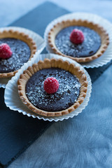 chocolate tart with raspberry on top