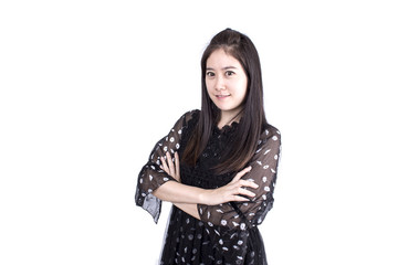 Beautiful young woman standing with arms folded isolated on a white background