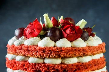 beautiful cake with bizet, grapes and roses