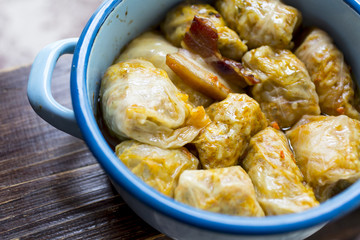 Sarma , traditional Balkan and Eastern European holiday food - rolled up cabbage leaves stuffed with rice and minced meat