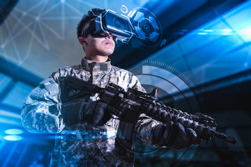 The abstract image of the soldier use a VR glasses for combat simulation training overlay with the hologram. the concept of virtual hologram, simulation, gaming, internet of things and future life.