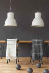 Dark dining room with blankets
