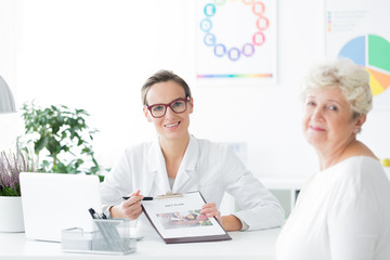 Fototapeta premium Dietician doctor looking at camera