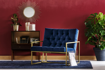 Blue armchair with golden frame