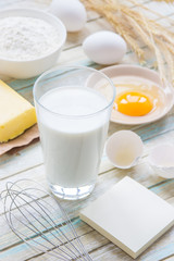 Ingredients for baking: milk, flour, egg and butter