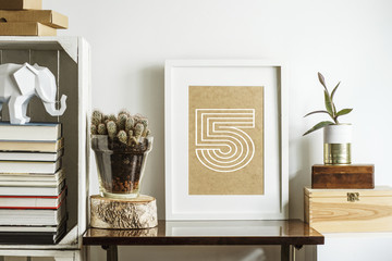 The room interior with mock up frame, cacti, plant and wooden boxes. Concept of retro shelfie. 