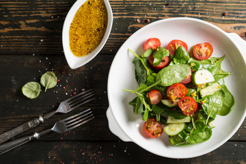 Summer salad of fresh vegetables and spinach