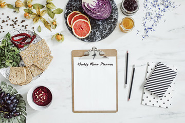 Enjoy healthy diet. Top view of different organic food on the white marble table  background.