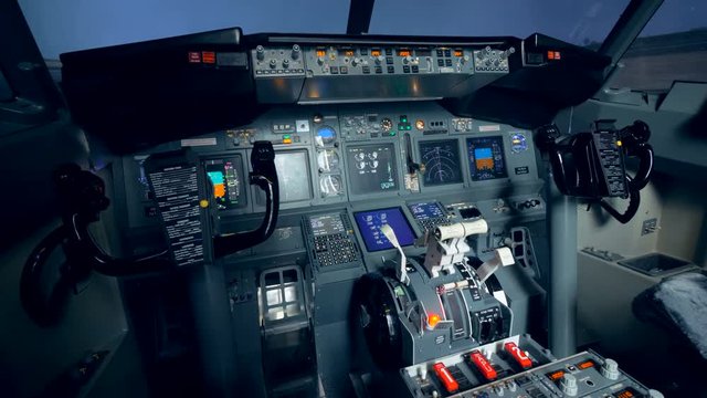An empty cockpit view in a plane, close up. 4K.