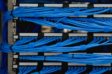 LAN cable wiring and networking in the network or server rack in the data center.
