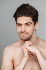 Obraz premium Beauty portrait of fit half naked smiling young man
