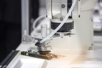 Industrial robot working in factory,Industry 4.0 Robot concept .