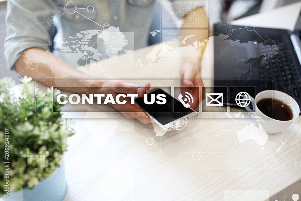 Aufkleber contact us button and text on virtual screen. business and technology concept.