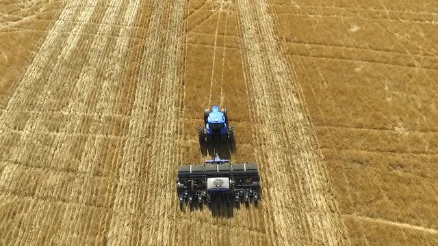 Tractor planting seeds