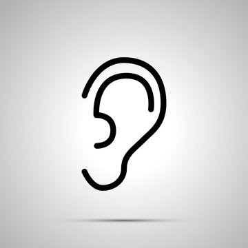 Simple black human ear icon with with shadow