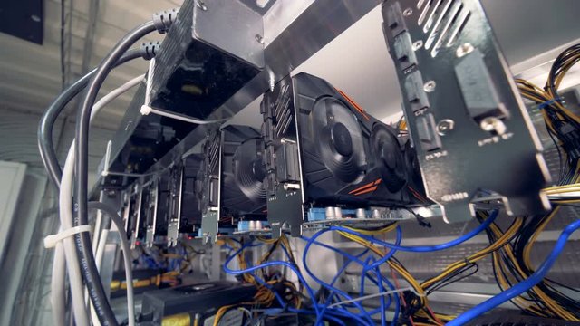 Graphic processing units are mining bitcoins in a mining rig