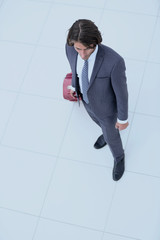 view from the top.businessman with Luggage