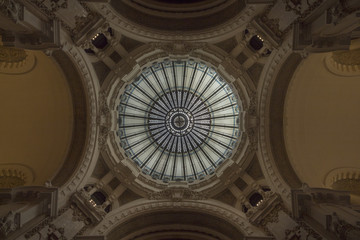 Obraz premium Cupola. White glass dome. stained glass cupola. Interior decoration in early 20th century building is rich in iron and details in perfect symmetry